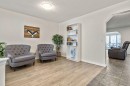 30 Drake Landing Common, Okotoks, AB  - Indoor Photo Showing Living Room 