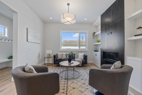 8108 47 Avenue Nw, Calgary, AB - Indoor Photo Showing Living Room With Fireplace