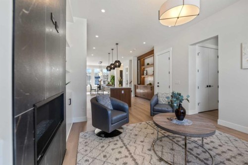 8108 47 Avenue Nw, Calgary, AB - Indoor Photo Showing Living Room With Fireplace