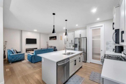 110 Waterford Road, Chestermere, AB - Indoor Photo Showing Kitchen With Stainless Steel Kitchen With Double Sink With Upgraded Kitchen