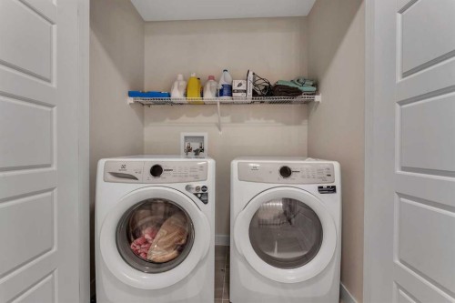 110 Waterford Road, Chestermere, AB - Indoor Photo Showing Laundry Room
