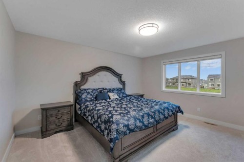 110 Waterford Road, Chestermere, AB - Indoor Photo Showing Bedroom