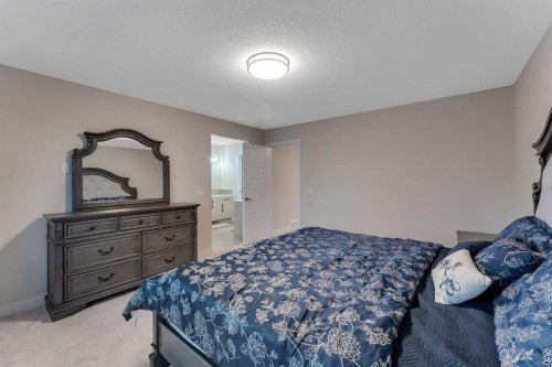 110 Waterford Road, Chestermere, AB - Indoor Photo Showing Bedroom