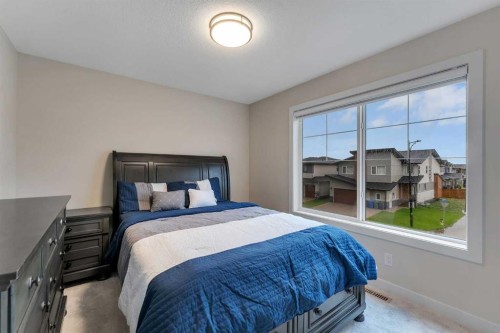 110 Waterford Road, Chestermere, AB - Indoor Photo Showing Bedroom