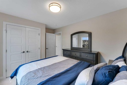 110 Waterford Road, Chestermere, AB - Indoor Photo Showing Bedroom