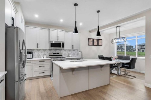 110 Waterford Road, Chestermere, AB - Indoor Photo Showing Kitchen With Upgraded Kitchen