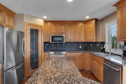 273 Everglade Circle Sw, Calgary, AB - Indoor Photo Showing Kitchen With Stainless Steel Kitchen With Double Sink