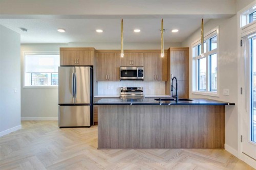 123 148 Avenue Nw, Calgary, AB - Indoor Photo Showing Kitchen With Double Sink