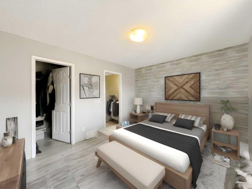101 Channelside Cove Sw, Airdrie, AB - Indoor Photo Showing Bedroom