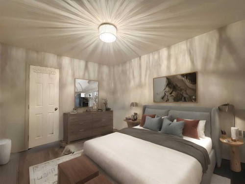 101 Channelside Cove Sw, Airdrie, AB - Indoor Photo Showing Bedroom