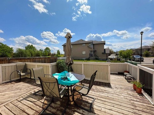 101 Channelside Cove Sw, Airdrie, AB - Outdoor With Deck Patio Veranda