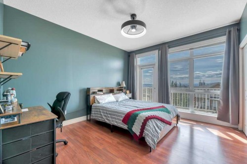 8-172 Rockyledge View Nw, Calgary, AB - Indoor Photo Showing Bedroom