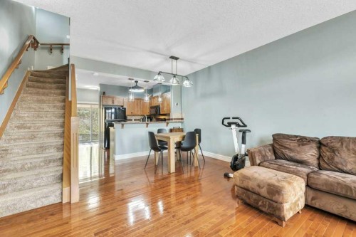 8-172 Rockyledge View Nw, Calgary, AB - Indoor Photo Showing Living Room