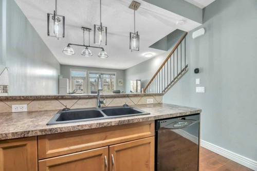 8-172 Rockyledge View Nw, Calgary, AB - Indoor Photo Showing Kitchen With Double Sink
