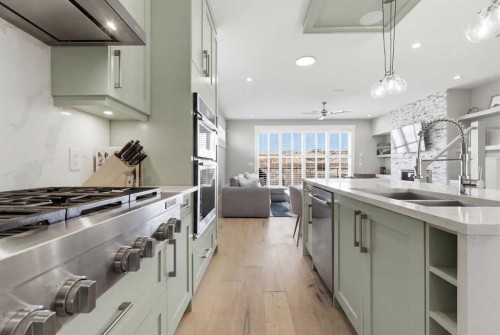 2024 36 Avenue, Calgary, AB - Indoor Photo Showing Kitchen With Double Sink With Upgraded Kitchen