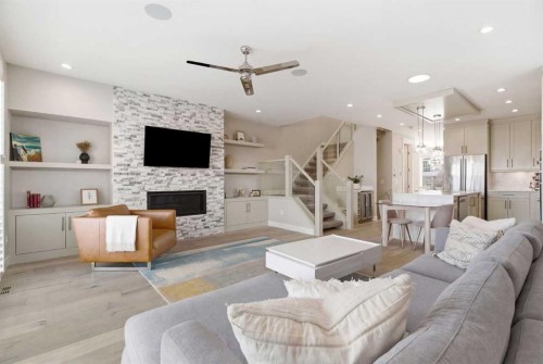 2024 36 Avenue, Calgary, AB - Indoor Photo Showing Living Room With Fireplace