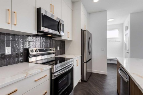 37 Sora Passage Se, Calgary, AB - Indoor Photo Showing Kitchen With Stainless Steel Kitchen