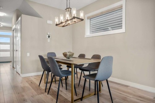 166 Howse Common Ne, Calgary, AB - Indoor Photo Showing Dining Room