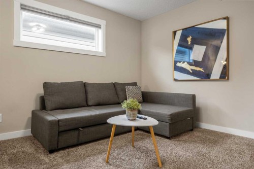 166 Howse Common Ne, Calgary, AB - Indoor Photo Showing Living Room