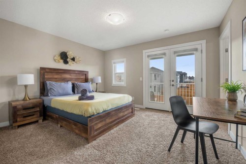 166 Howse Common Ne, Calgary, AB - Indoor Photo Showing Bedroom