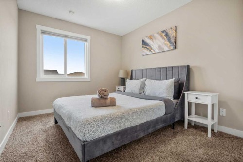 166 Howse Common Ne, Calgary, AB - Indoor Photo Showing Bedroom