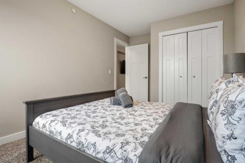 166 Howse Common Ne, Calgary, AB - Indoor Photo Showing Bedroom