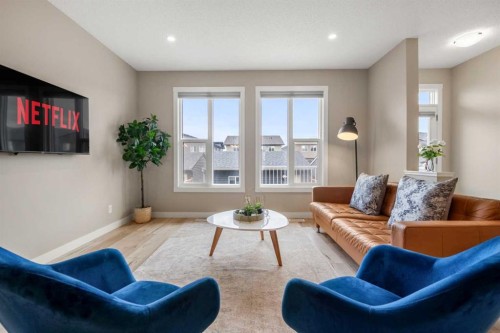 166 Howse Common Ne, Calgary, AB - Indoor Photo Showing Living Room