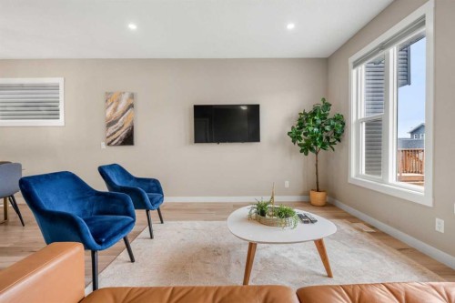 166 Howse Common Ne, Calgary, AB - Indoor Photo Showing Living Room
