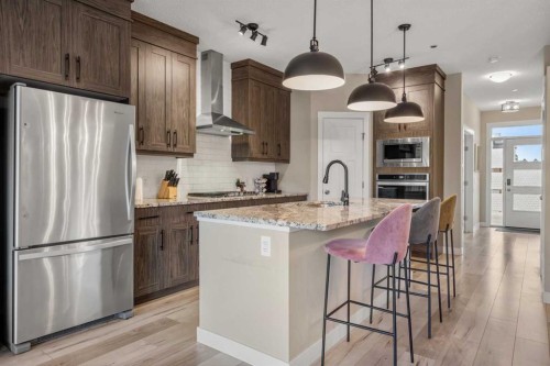 166 Howse Common Ne, Calgary, AB - Indoor Photo Showing Kitchen With Upgraded Kitchen