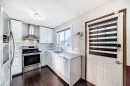 11 Martinwood Road Ne, Calgary, AB  - Indoor Photo Showing Kitchen With Double Sink 
