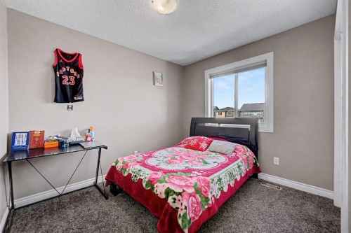644 Luxstone Landing Sw, Airdrie, AB - Indoor Photo Showing Bedroom