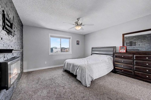 644 Luxstone Landing Sw, Airdrie, AB - Indoor Photo Showing Bedroom