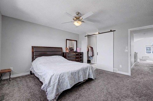 644 Luxstone Landing Sw, Airdrie, AB - Indoor Photo Showing Bedroom