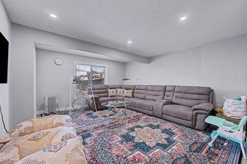 644 Luxstone Landing Sw, Airdrie, AB - Indoor Photo Showing Living Room