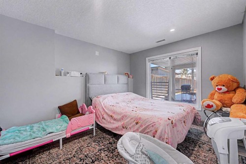 644 Luxstone Landing Sw, Airdrie, AB - Indoor Photo Showing Bedroom