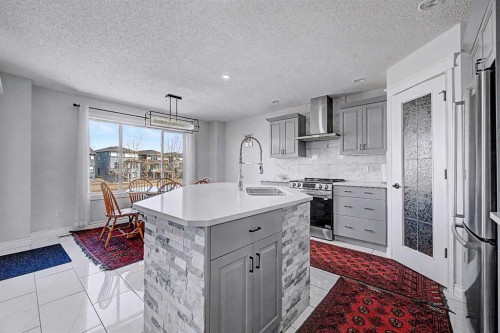 644 Luxstone Landing Sw, Airdrie, AB - Indoor Photo Showing Kitchen With Upgraded Kitchen