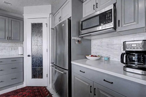 644 Luxstone Landing Sw, Airdrie, AB - Indoor Photo Showing Kitchen