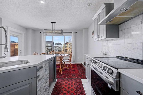 644 Luxstone Landing Sw, Airdrie, AB - Indoor Photo Showing Kitchen