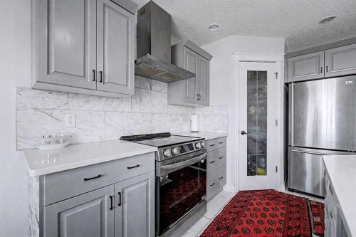 644 Luxstone Landing Sw, Airdrie, AB - Indoor Photo Showing Kitchen With Stainless Steel Kitchen With Upgraded Kitchen