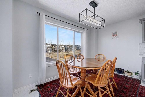 644 Luxstone Landing Sw, Airdrie, AB - Indoor Photo Showing Dining Room
