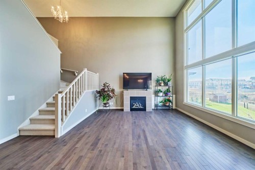 109 Sherwood Road Nw, Calgary, AB - Indoor Photo Showing Other Room With Fireplace