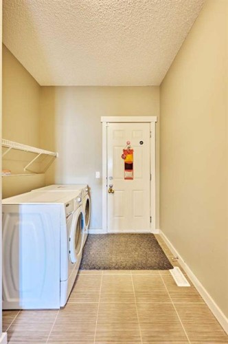 109 Sherwood Road Nw, Calgary, AB - Indoor Photo Showing Laundry Room