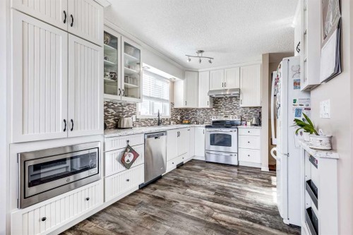 79 Macewan Meadow Way Nw, Calgary, AB - Indoor Photo Showing Kitchen With Upgraded Kitchen