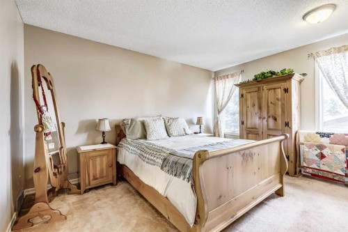 79 Macewan Meadow Way Nw, Calgary, AB - Indoor Photo Showing Bedroom