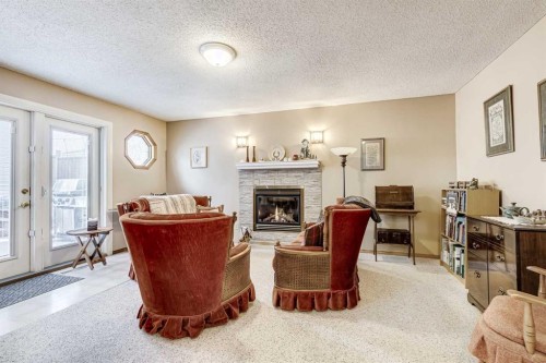 79 Macewan Meadow Way Nw, Calgary, AB - Indoor With Fireplace