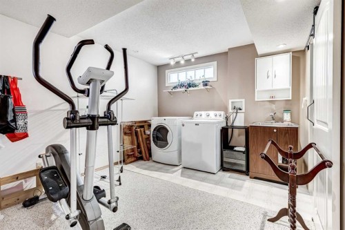 79 Macewan Meadow Way Nw, Calgary, AB - Indoor Photo Showing Laundry Room