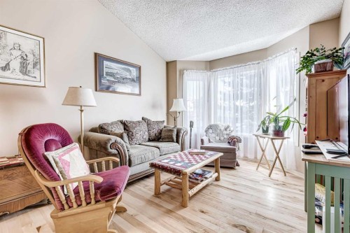 79 Macewan Meadow Way Nw, Calgary, AB - Indoor Photo Showing Living Room