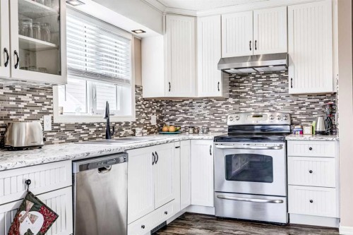 79 Macewan Meadow Way Nw, Calgary, AB - Indoor Photo Showing Kitchen With Upgraded Kitchen