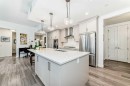 101-10 Mahogany Circle Se, Calgary, AB  - Indoor Photo Showing Kitchen With Upgraded Kitchen 