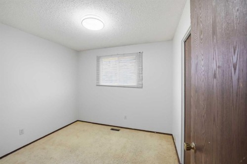 62 Templeson Crescent Ne, Calgary, AB - Indoor Photo Showing Other Room